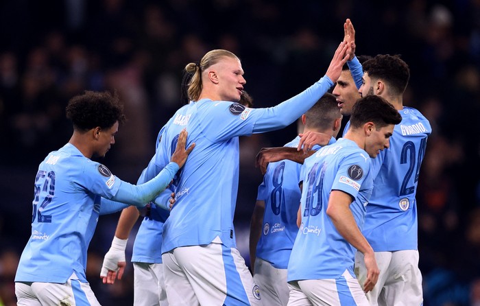 Soccer Football - Champions League - Round of 16 - Second Leg - Manchester City v FC Copenhagen - Etihad Stadium, Manchester, Britain - March 6, 2024 Manchester Citys Erling Braut Haaland celebrates scoring their third goal with teammates REUTERS/Carl Recine