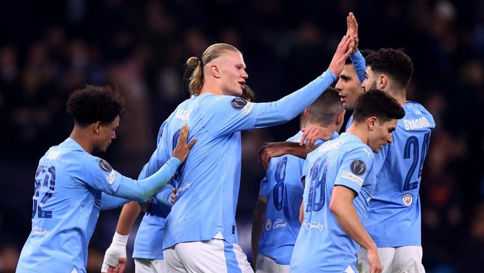 Soccer Football - Champions League - Round of 16 - Second Leg - Manchester City v FC Copenhagen - Etihad Stadium, Manchester, Britain - March 6, 2024 Manchester City's Erling Braut Haaland celebrates scoring their third goal with teammates REUTERS/Carl Recine