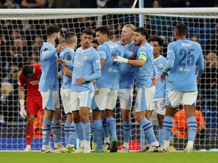 Soccer Football - Champions League - Round of 16 - Second Leg - Manchester City v FC Copenhagen - Etihad Stadium, Manchester, Britain - March 6, 2024 Manchester Citys Erling Braut Haaland celebrates scoring their third goal with teammates REUTERS/Phil Noble