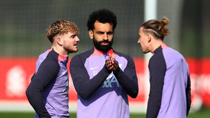 Soccer Football - Europa League - Liverpool Training - AXA Training Centre, Liverpool, Britain - March 6, 2024 Liverpools Mohamed Salah, Kostas Tsimikas and Harvey Elliott during training Action Images via Reuters/Andrew Boyers
