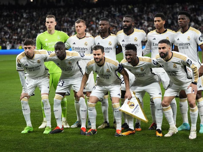 Real Madrid's players pose for photographers prior to the start of the Champions League round of 16 second leg soccer match between Real Madrid and RB Leipzig at the Santiago Bernabeu stadium in Madrid, Spain, Wednesday, March 6, 2024. (AP Photo/Manu Fernandez)
