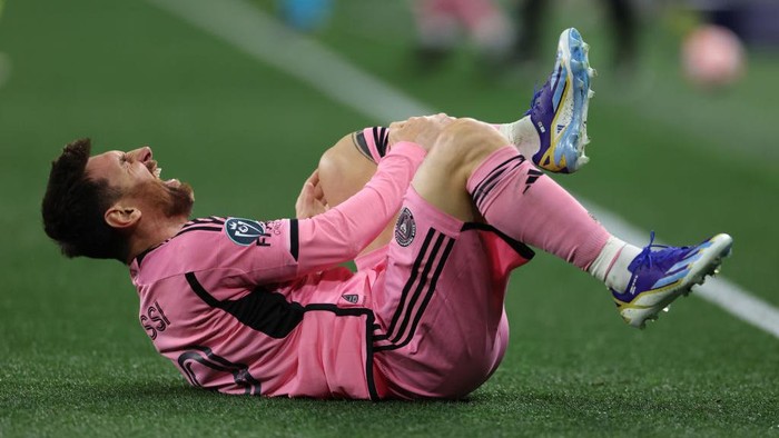 Lionel Messi, Nashville NASHVILLE, TENNESSEE - MARCH 07: Lionel Messi #10 of Inter Miami CF reacts after suffering an injury against Nashville SC during the second half during the Concacaf Champions Cup Leg One Round of 16 match at GEODIS Park on March 07, 2024 in Nashville, Tennessee. (Photo by Donald Page/Getty Images)