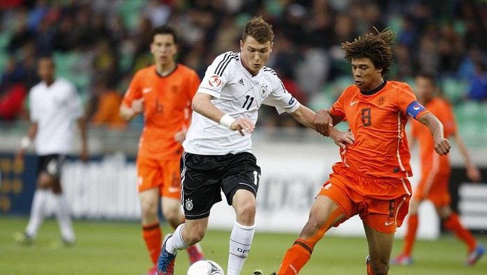 LJUBLJANA, SLOVENIA - MAY 16: Maximilian Dittgen of Germany is challenged by Nathan Ake of Netherlands during the UEFA U17 European Championship game between Netherlands and Germany at SRC Stozice Stadium on May 16, 2012 in Ljubljana, Slovenia. (Photo by Mathias Kniepeiss/Bongarts/Getty Images)