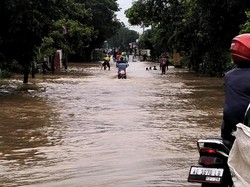 Banjir Luapan Bengawan Solo dan Sungai Madiun Meluas ke 35 Desa di Ngawi