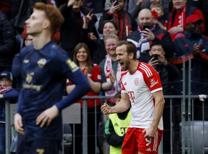 Soccer Football - Bundesliga - Bayern Munich v 1. FSV Mainz 05 - Allianz Arena, Munich, Germany - March 9, 2024 Bayern Munichs Harry Kane celebrates scoring their third goal REUTERS/Michaela Stache DFL REGULATIONS PROHIBIT ANY USE OF PHOTOGRAPHS AS IMAGE SEQUENCES AND/OR QUASI-VIDEO.