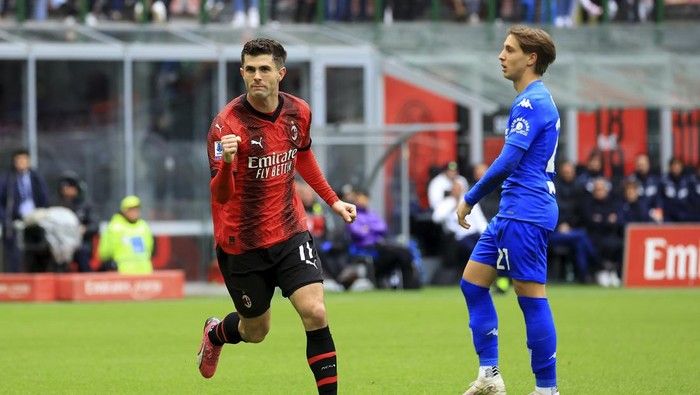 MILAN, ITALY - MARCH 10: Christian Pulisic of AC Milan celebrates after scoring the opening goal during the Serie A TIM match between AC Milan and Empoli FC - Serie A TIM  at Stadio Giuseppe Meazza on March 10, 2024 in Milan, Italy. (Photo by Giuseppe Cottini/AC Milan via Getty Images)