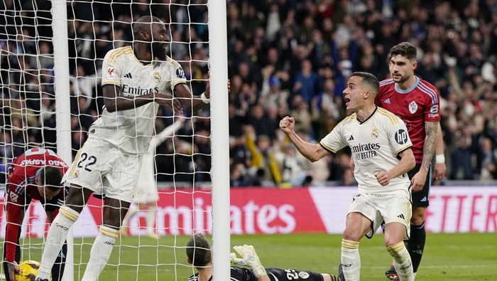 Soccer Football - LaLiga - Real Madrid v Celta Vigo - Santiago Bernabeu, Madrid, Spain - March 10, 2024 Real Madrids Brahim Diaz and Antonio Rudiger celebrates their second goal, an own goal scored by Celta Vigos Vicente Guaita REUTERS/Ana Beltran