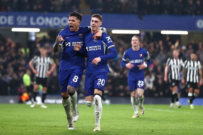 LONDON, ENGLAND - MARCH 11: Cole Palmer of Chelsea celebrates scoring his sides second goal with team mate Enzo Fernandez during the Premier League match between Chelsea FC and Newcastle United at Stamford Bridge on March 11, 2024 in London, England. (Photo by Alex Pantling/Getty Images)