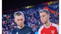 Atau jangan-jangan Clement Turpin dan Trossard ini sebetulnya bapak dan anak? (Foto: @ATNGTV)
