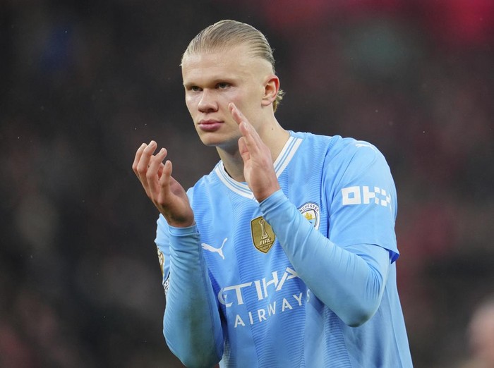 Manchester City's Erling Haaland applauds after the English Premier League soccer match between Liverpool and Manchester City, at Anfield stadium in Liverpool, England, Sunday, March 10, 2024. The match ended 1-1. (AP Photo/Jon Super)