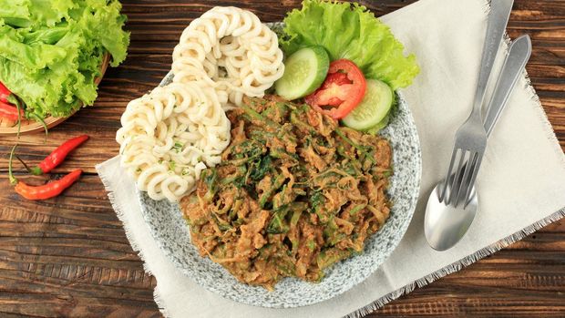Ilustrasi Lotek Karedok Lotek Karedok, SUndanese Signature Dish, Steamed or Raw Vegetable with Spicy Peanut Sauce. Top View