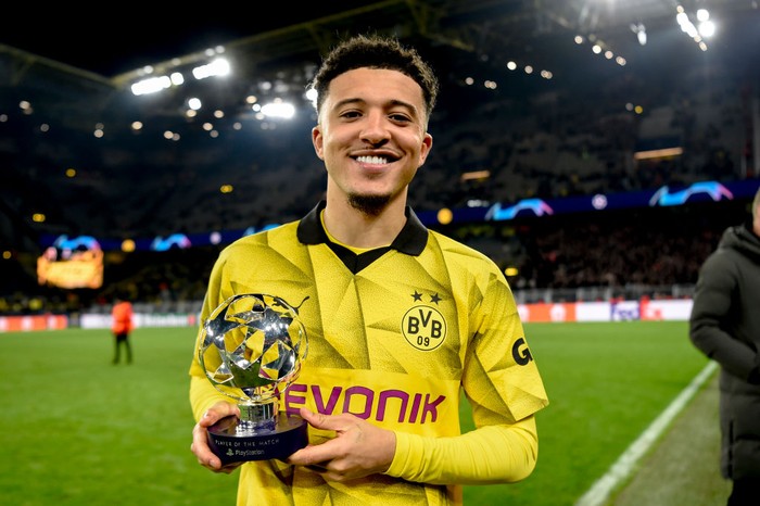 DORTMUND, GERMANY - MARCH 13:  Jaden Sancho of Borussia Dortmund poses as he is awarded as players of the match following the UEFA Champions League 2023/24 round of 16 second leg match between Borussia Dortmund and PSV Eindhoven at Signal Iduna Park on March 13, 2024 in Dortmund, Germany. (Photo by Alexandre Simoes/Borussia Dortmund via Getty Images)
