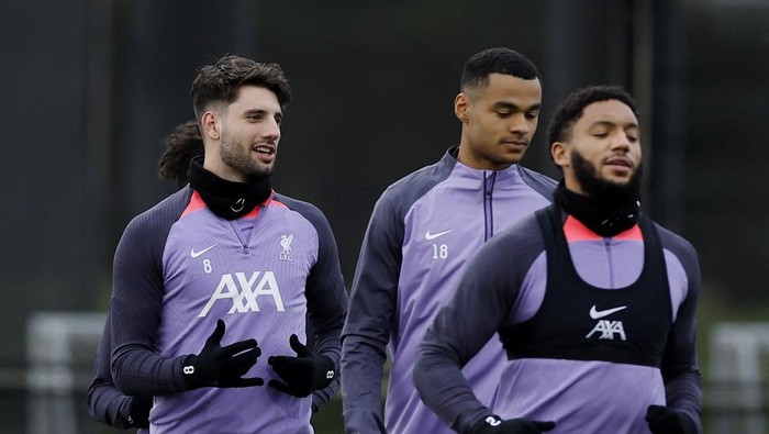 Soccer Football - Europa League - Liverpool Training - AXA Training Centre, Liverpool, Britain - March 13, 2024  Liverpools Joe Gomez, Cody Gakpo and Dominik Szoboszlai during training Action Images via Reuters/Jason Cairnduff