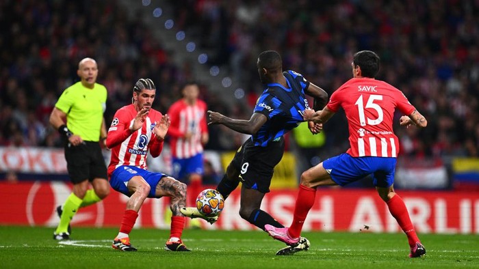 Marcus Thuram, Stefan Savic MADRID, SPAIN - MARCH 13: Marcus Thuram of FC Internazionale competes for the ball with Savic of Atletico Madrid during the UEFA Champions League 2023/24 round of 16 second leg match between Atlético Madrid and FC Internazionale at Civitas Metropolitano Stadium on March 13, 2024 in Madrid, Spain. (Photo by Mattia Ozbot - Inter/Inter via Getty Images)