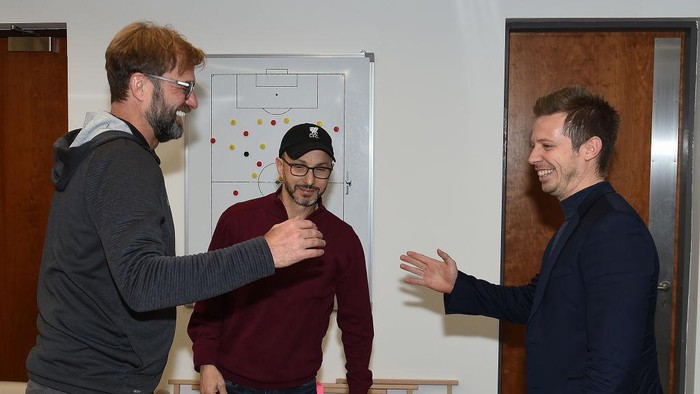 LIVERPOOL, ENGLAND - DECEMBER 13: Jurgen Klopp Signs A Contract Extension and chats with Sporting Director Michael Edwards and Mike Gordon FSG President and Liverpool F.C owner at Melwood Training Ground on December 13, 2019 in Liverpool, England. (Photo by John Powell/Liverpool FC via Getty Images)