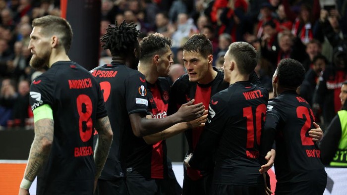LEVERKUSEN, GERMANY - MARCH 14: Patrik Schick of Bayer Leverkusen celebrates scoring his teams second goal with teammates during the UEFA Europa League 2023/24 round of 16 second leg match between Bayer 04 Leverkusen and Qarabag FK at BayArena on March 14, 2024 in Leverkusen, Germany. (Photo by Alex Grimm/Getty Images)