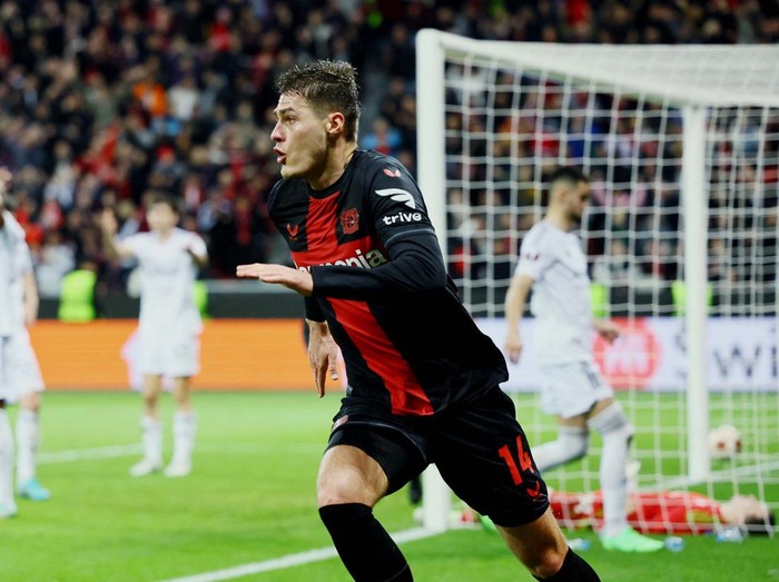 Soccer Football - Europa League - Round of 16 - Second Leg - Bayer Leverkusen v Qarabag - BayArena, Leverkusen, Germany - March 14, 2024
Bayer Leverkusen's Jeremie Frimpong celebrates scoring their first goal REUTERS/Wolfgang Rattay