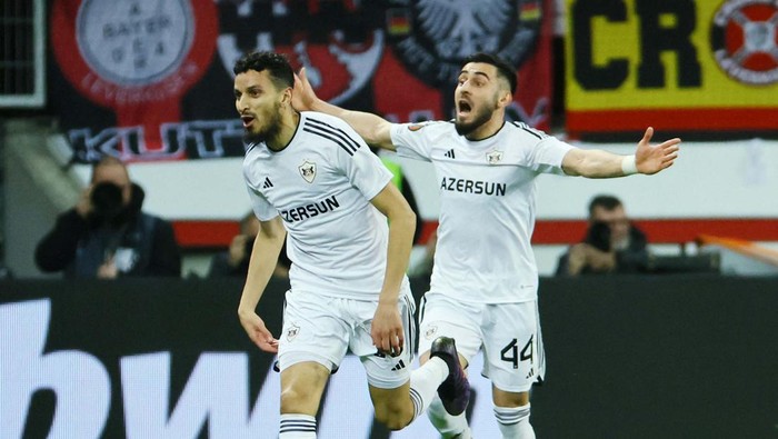 Catatan Gemilang Leverkusen Terus Berlanjut Soccer Football - Europa League - Round of 16 - Second Leg - Bayer Leverkusen v Qarabag - BayArena, Leverkusen, Germany - March 14, 2024
Bayer Leverkusen's Jeremie Frimpong celebrates scoring their first goal REUTERS/Wolfgang Rattay