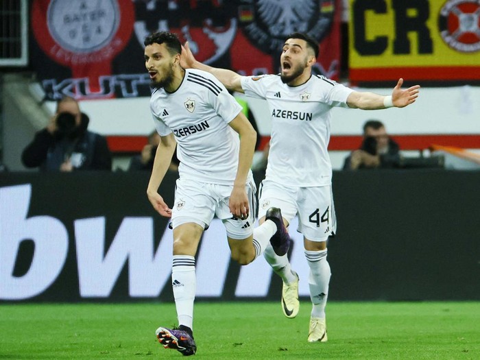 Soccer Football - Europa League - Round of 16 - Second Leg - Bayer Leverkusen v Qarabag - BayArena, Leverkusen, Germany - March 14, 2024
Bayer Leverkusen's Jeremie Frimpong celebrates scoring their first goal REUTERS/Wolfgang Rattay