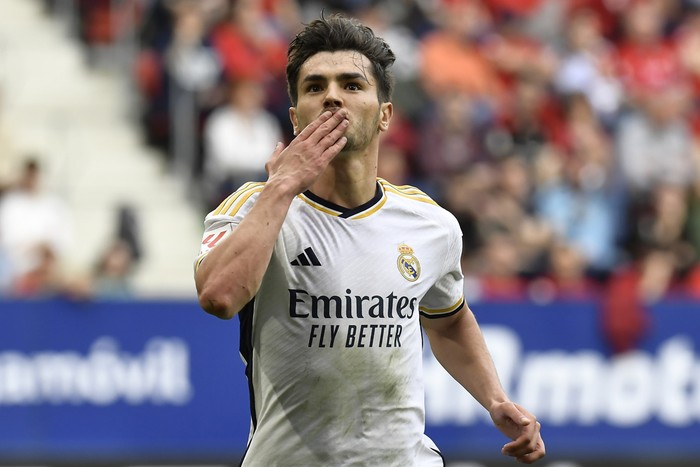 Real Madrids Brahim Diaz celebrates after scoring his sides third goal during the Spanish La Liga soccer match between Osasuna and Real Madrid at the El Sadar stadium in Pamplona, Spain, Saturday, March 16, 2023. (AP Photo/Alvaro Barrientos)