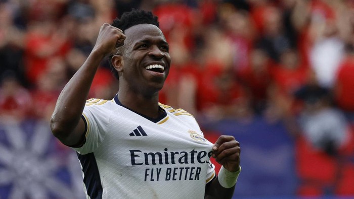 Soccer Football - LaLiga - Osasuna v Real Madrid - El Sadar Stadium, Pamplona, Spain - March 16, 2024 Real Madrids Vinicius Junior celebrates scoring their fourth goal REUTERS/Vincent West