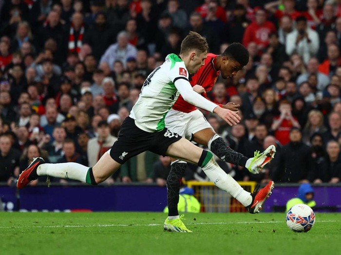Soccer Football - FA Cup - Quarter Final - Manchester United v Liverpool - Old Trafford, Manchester, Britain - March 17, 2024
Manchester United's Amad Diallo celebrates scoring their fourth goal REUTERS/Molly Darlington