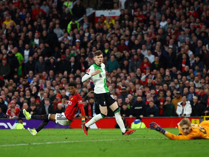 Soccer Football - FA Cup - Quarter Final - Manchester United v Liverpool - Old Trafford, Manchester, Britain - March 17, 2024
Manchester United's Amad Diallo celebrates scoring their fourth goal REUTERS/Molly Darlington