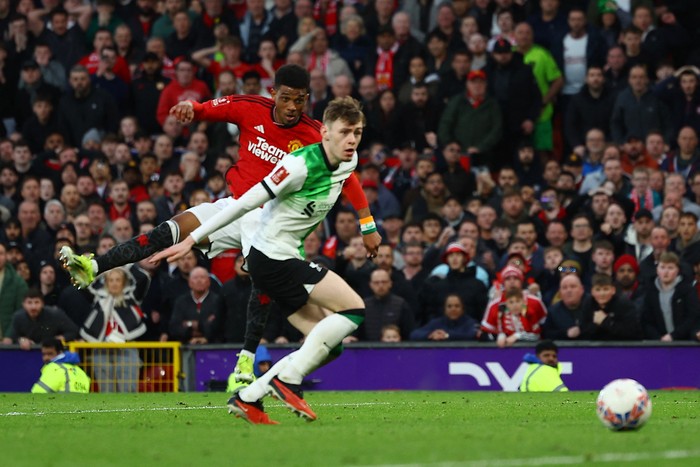Soccer Football - FA Cup - Quarter Final - Manchester United v Liverpool - Old Trafford, Manchester, Britain - March 17, 2024 Manchester Uniteds Amad Diallo scores their fourth goal REUTERS/Molly Darlington