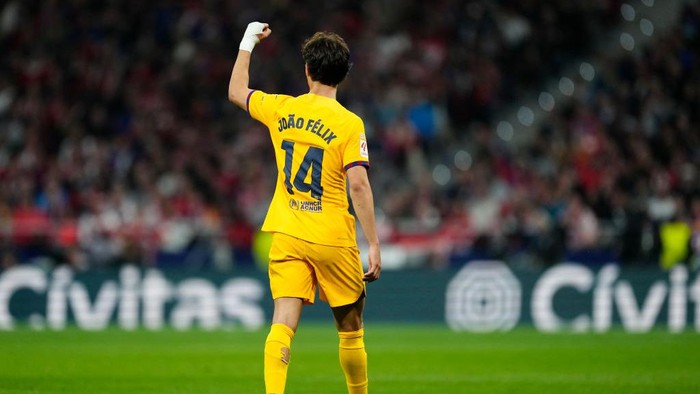 Joao Felix second striker of Barcelona and Portugal celebrates after scoring his sides first goal during the LaLiga EA Sports match between Atletico Madrid and FC Barcelona at Civitas Metropolitano Stadium on March 17, 2024 in Madrid, Spain. (Photo by Jose Breton/Pics Action/NurPhoto via Getty Images)