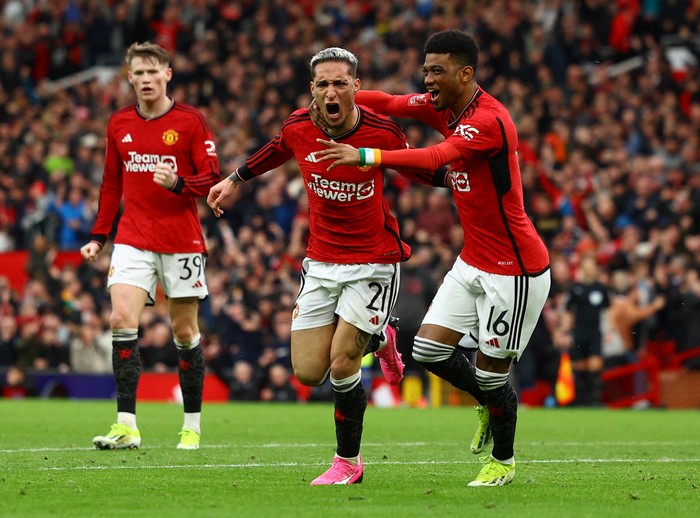 Manchester United Soccer Football - FA Cup - Quarter Final - Manchester United v Liverpool - Old Trafford, Manchester, Britain - March 17, 2024 Manchester United's Antony celebrates scoring their second goal with Amad Diallo REUTERS/Molly Darlington TPX IMAGES OF THE DAY