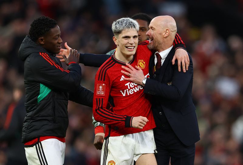 Soccer Football - FA Cup - Quarter Final - Manchester United v Liverpool - Old Trafford, Manchester, Britain - March 17, 2024 Manchester United's Kobbie Mainoo, manager Erik ten Hag and Alejandro Garnacho celebrate after the match REUTERS/Molly Darlington