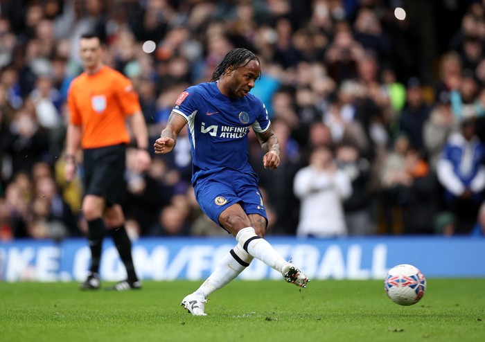 Soccer Football - FA Cup - Quarter Final - Chelsea v Leicester City - Stamford Bridge, London, Britain - March 17, 2024 Chelseas Raheem Sterling has his penalty saved by Leicester Citys Jakub Stolarczyk Action Images via Reuters/Andrew Boyers