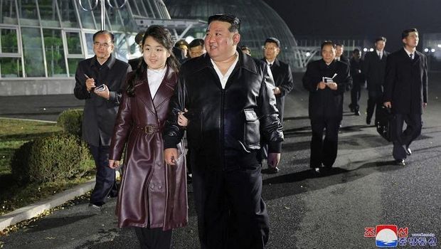 North Korean leader Kim Jong-un and his daughter Ju Ae visit a greenhouse complex in Pyongyang, on March 16. - PHOTO: AFP