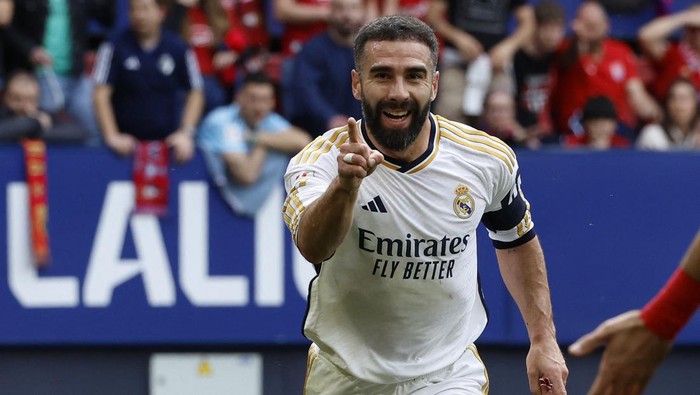 Soccer Football - LaLiga - Osasuna v Real Madrid - El Sadar Stadium, Pamplona, Spain - March 16, 2024 Real Madrids Dani Carvajal celebrates scoring their second goal REUTERS/Vincent West