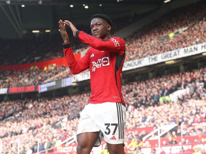 MANCHESTER, ENGLAND - MARCH 09: Kobbie Mainoo of Manchester United walks off after being substituted during the Premier League match between Manchester United and Everton FC at Old Trafford on March 09, 2024 in Manchester, England. (Photo by Matthew Peters/Manchester United via Getty Images)