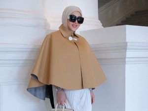 6 Gaya Syahrini Diduga Tutupi Kehamilan, Pakai Cape Sambil Tenteng Tas Rp 1 M