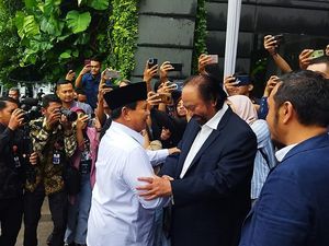 Beda Penyambutan Karpet Merah Prabowo dengan Anies di NasDem Tower