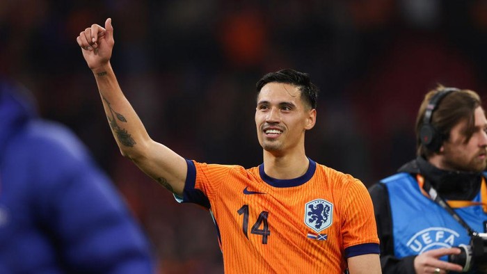 AMSTERDAM, NETHERLANDS - MARCH 22: Netherlands Tijjani Reijnders celebrates at full time during an international friendly match between the Netherlands and Scotland at the Johan Cruyff Arena, on March 22, 2024, in Amsterdam, Netherlands. (Photo by Craig Williamson/SNS Group via Getty Images)