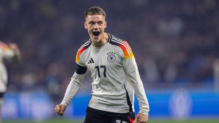 LYON, FRANCE - MARCH 23: Florian Wirtz of Germany celebrates after scoring his teams first goal during the international friendly match between France and Germany at Groupama Stadium on March 23, 2024 in Lyon, France. (Photo by Boris Streubel/Getty Images)
