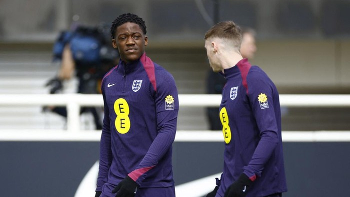 Soccer Football - International Friendly - England Training - St Georges Park, Burton upon Trent, Britain - March 22, 2024 Englands Kobbie Mainoo with teammate during training Action Images via Reuters/John Sibley