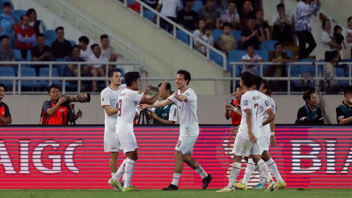 HANOI, VIETNAM - MARCH 26: Ramadhan Sananta (2nd L) of Indonesia celebrates with teammates after scoring the teams third goal during the FIFA World Cup Asian second qualifier Group F match between Vietnam and Indonesia at My Dinh National Stadium on March 26, 2024 in Hanoi, Vietnam. (Photo by Minh Hoang/Getty Images)