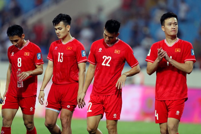 HANOI, VIETNAM - MARCH 26: Vietnam players look dejected after the teams 0-3 defeat in the FIFA World Cup Asian second qualifier Group F match between Vietnam and Indonesia at My Dinh National Stadium on March 26, 2024 in Hanoi, Vietnam. (Photo by Minh Hoang/Getty Images)
