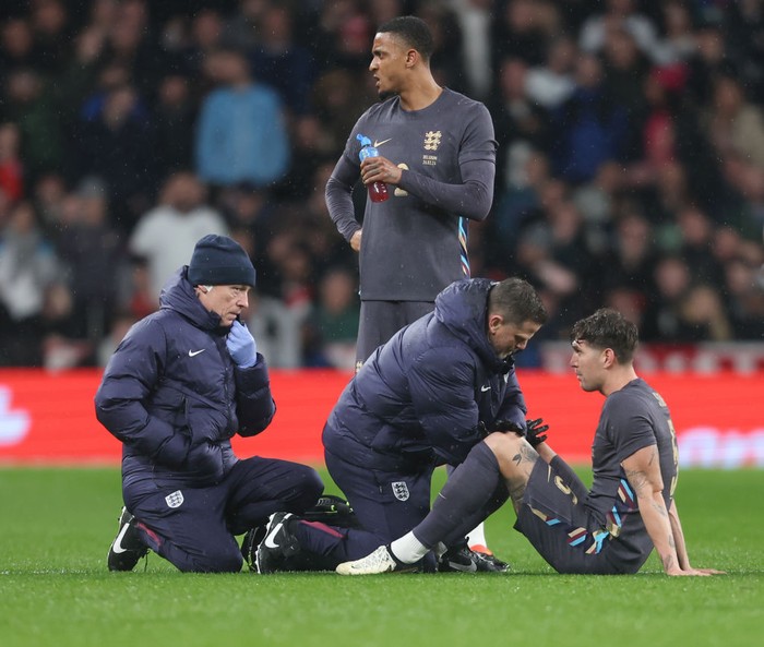 LONDON, ENGLAND - MARCH 26: Englands John Stones  receives treatment during the international friendly match between England and Belgium at Wembley Stadium on March 26, 2024 in London, England.(Photo by Rob Newell - CameraSport via Getty Images)