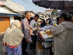Polisi Imbau Pedagang di Pasar Pondok Aren Waspadai Uang Palsu