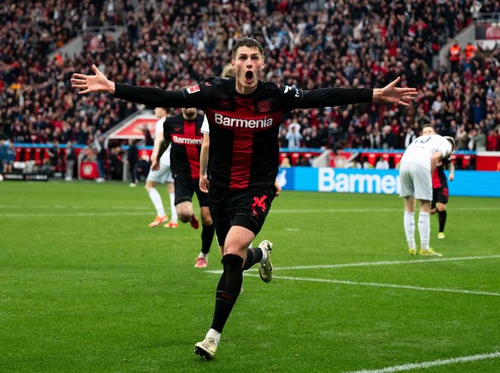 30 March 2024, North Rhine-Westphalia, Leverkusen: Soccer: Bundesliga, Bayer Leverkusen - TSG 1899 Hoffenheim, Matchday 27, BayArena. Leverkusen's Patrik Schick celebrates after scoring to take a 2-1 lead. Photo: Marius Becker/dpa - IMPORTANT NOTE: In accordance with the regulations of the DFL German Football League and the DFB German Football Association, it is prohibited to utilize or have utilized photographs taken in the stadium and/or of the match in the form of sequential images and/or video-like photo series. (Photo by Marius Becker/picture alliance via Getty Images)