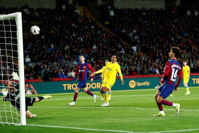 Barcelonas Joao Felix, attempts a shot at goal and hit the bar during a Spanish La Liga soccer match between Barcelona and Las Palmas at the Olimpic Lluis Companys stadium in Barcelona, Spain, Saturday, March 30, 2024. (AP Photo/Joan Monfort)