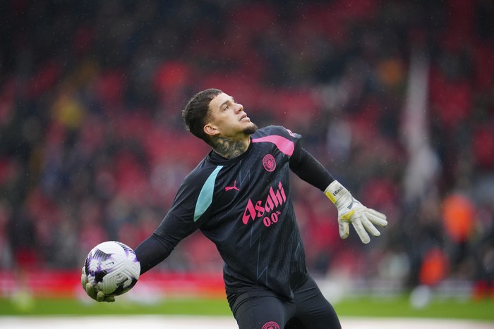 Ederson Manchester City's goalkeeper Ederson throws the ball ahead of the English Premier League soccer match between Liverpool and Manchester City, at Anfield stadium in Liverpool, England, Sunday, March 10, 2024. (AP Photo/Jon Super)
