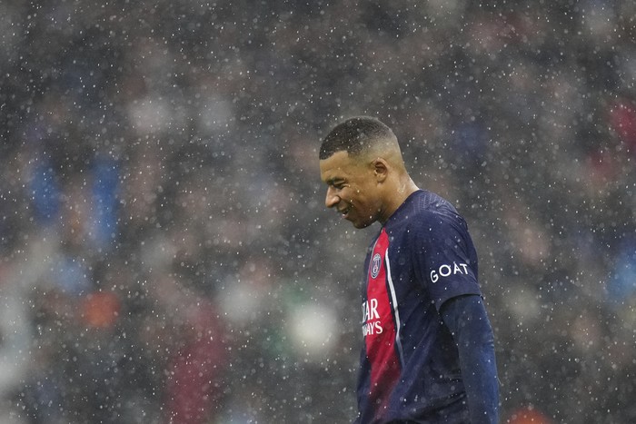 Kylian Mbappe PSG's Kylian Mbappe leaves the pitch during the French League One soccer match between Marseille and Paris at the Velodrome stadium in Marseille, south of France, Sunday, March 31, 2024. (AP Photo/Daniel Cole)