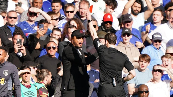 Burnley manager Vincent Kompany is shown a red card by referee Darren England during the Premier League match at Stamford Bridge, London. Picture date: Saturday March 30, 2024. (Photo by Zac Goodwin/PA Images via Getty Images)