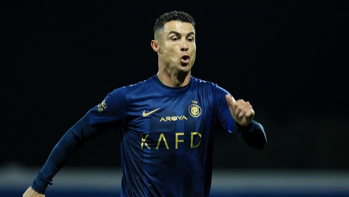 Soccer Football - Saudi Pro League - Abha v Al Nassr - Prince Sultan bin Abdulaziz Sports City, Abha, Saudi Arabia - April 2, 2024 Al Nassrs Cristiano Ronaldo celebrates scoring their fourth goal to complete his hat-trick REUTERS/Stringer